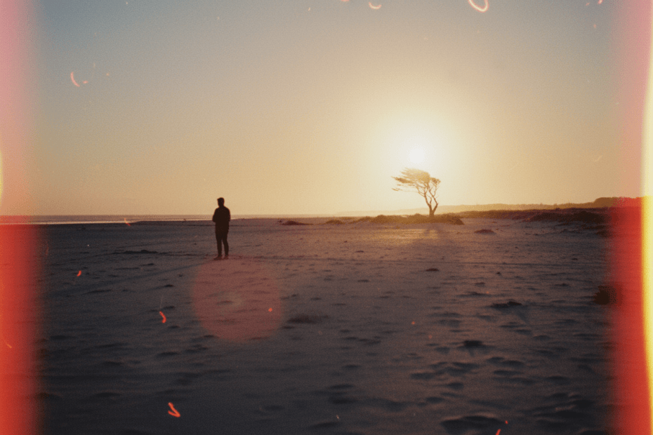 Film photography imperfections with analog grain and warm light leaks