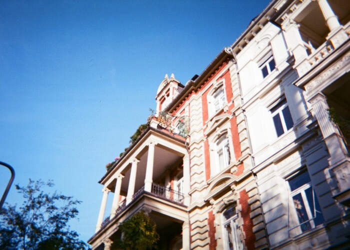 Facade of an old house with a balcony