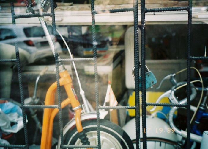 Bicycle by a glass wall